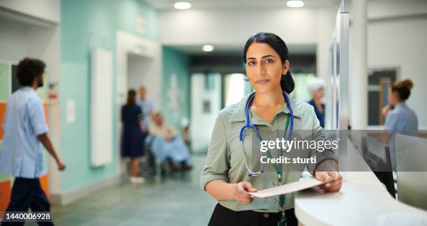 proud hospital staff doctor - patient in hospital stock pictures, royalty-free photos & images