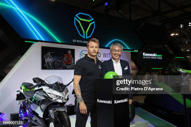 Kimi Räikkönen and Hiroshi Ito attends at Yamaha stand during the EICMA International Exhibition Cycle Motorcycle and Accessories show on November...