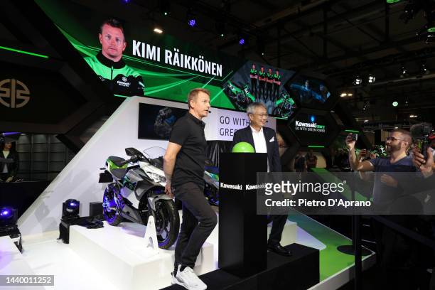 Kimi Räikkönen and Hiroshi Ito attends at Yamaha stand during the EICMA International Exhibition Cycle Motorcycle and Accessories show on November...