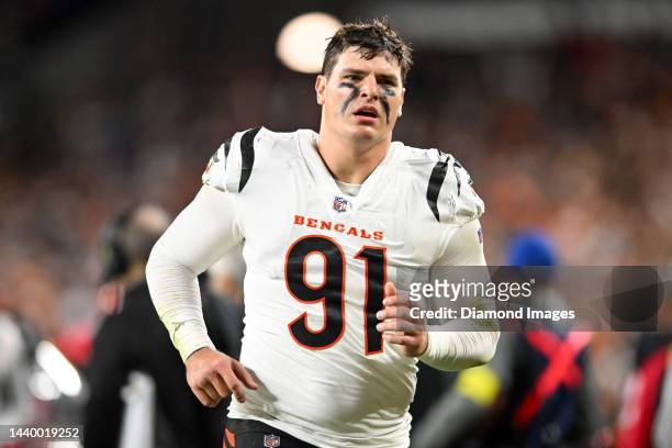 Trey Hendrickson of the Cincinnati Bengals runs off the field at halftime against the Cleveland Browns at FirstEnergy Stadium on October 31, 2022 in...