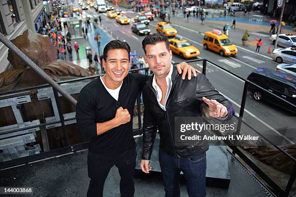 Extra" host Mario Lopez interviews Ricky Martin at the Hard Rock Cafe New York on May 7, 2012 in New York City.