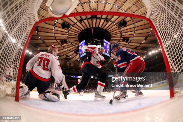 Braden Holtby of the Washington Capitals tends goal against Marian Gaborik of the New York Rangers in Game Five of the Eastern Conference Semifinals...