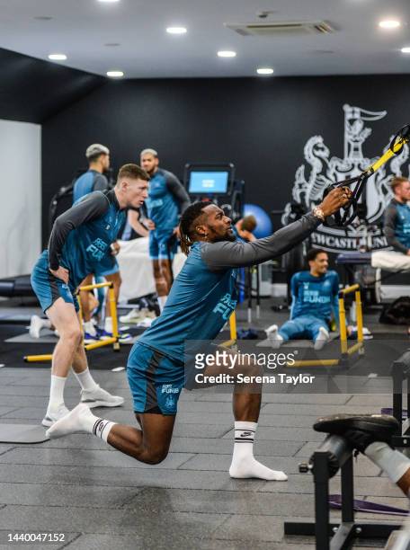 Allan Saint-Maximin stretches in the gym during the Newcastle United Training Session at the Newcastle United Training Centre on November 08, 2022 in...
