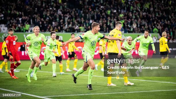 Micky van den Ven of Wolfsburg celebrates after scoring his team's first goal during the Bundesliga match between VfL Wolfsburg and Borussia Dortmund...