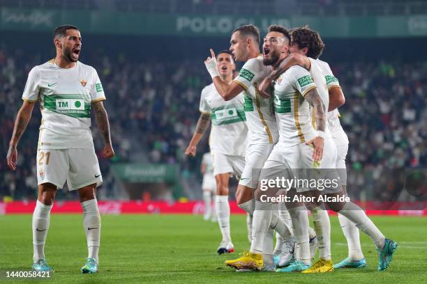 Pol Lirola of Elche CF celebrates after scoring their team's first goal during the LaLiga Santander match between Elche CF and Girona FC at Estadio...