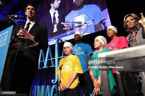 Olympic Gold Medalists Michael Phelps and Donna de Varona attend the 34th Annual American Image Awards at Cipriani 42nd Street on May 7, 2012 in New...