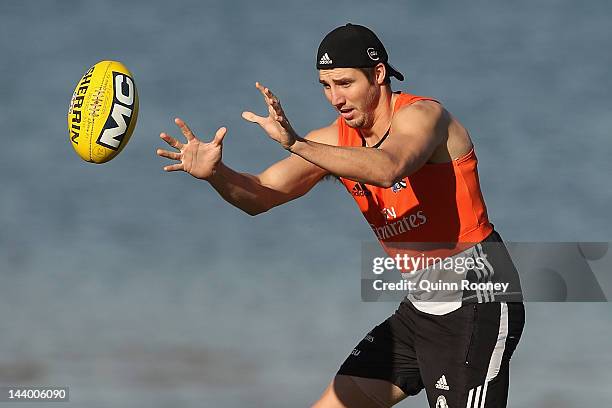 Dale Thomas of the Magpies marks during a Collingwood Magpies AFL recovery session at the St Kilda Sea Baths on May 8, 2012 in Melbourne, Australia.