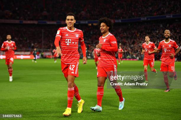 Jamal Musiala of Bayern Munich celebrates after scoring their team's first goal during the Bundesliga match between FC Bayern Muenchen and SV Werder...