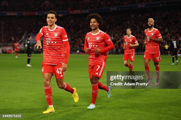 Jamal Musiala of Bayern Munich celebrates after scoring their team's first goal during the Bundesliga match between FC Bayern Muenchen and SV Werder...