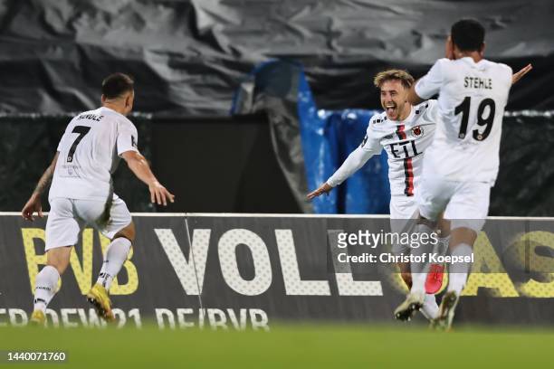Simon Handle, Luca Marseiler and Simon Stehle of Viktoria Koeln celebrate the first goal during the 3. Liga match between Borussia Dortmund II and...