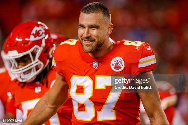 Travis Kelce of the Kansas City Chiefs smiles after pregame warmups during pregame warmups prior to the game against the Tennessee Titans at...