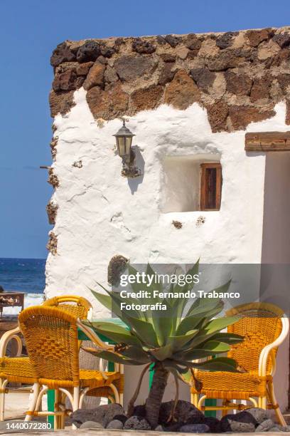 typical house in a fishing village - insel lanzarote stock-fotos und bilder
