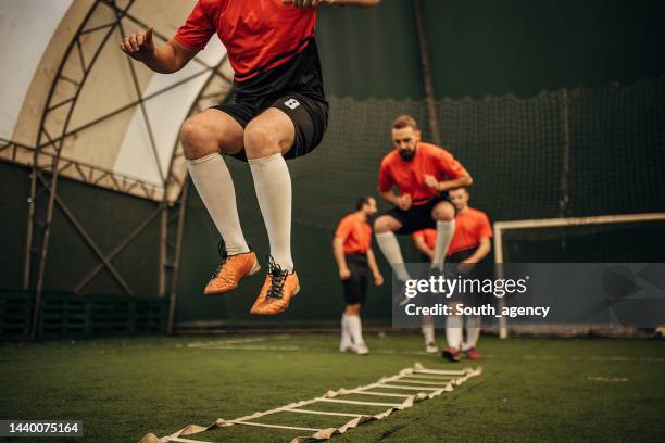 soccer players training - sports training drill stock pictures, royalty-free photos & images