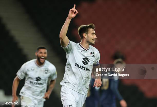 Warren O'Hora of Milton Keynes Dons celebrates after scoring their team's first goal during the Carabao Cup Third Round match between Milton Keynes...