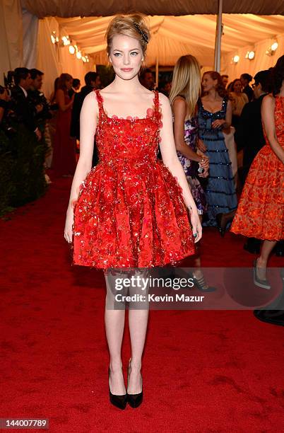 Emma Stone attends the "Schiaparelli And Prada: Impossible Conversations" Costume Institute Gala at the Metropolitan Museum of Art on May 7, 2012 in...