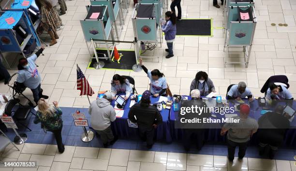 Clark County Election Department poll workers check people in to vote at the Meadows Mall on November 08, 2022 in Las Vegas, Nevada. After months of...