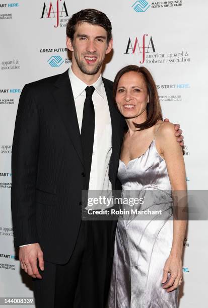 Olympic Gold Medalist Michael Phelps and CEO of Warnaco Group Helen McCluskey attend the 34th Annual American Image Awards at Cipriani 42nd Street on...