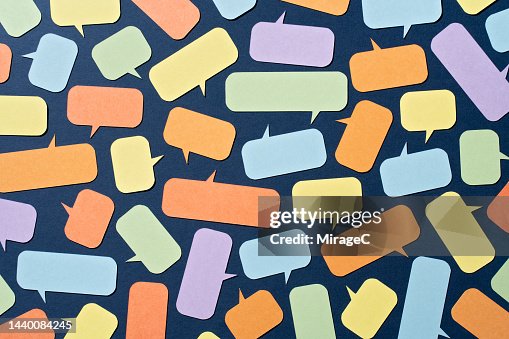 Abundance of Colorful Paper Speech Bubbles on Blue Abundance of Colorful Paper Speech Bubbles on Blue