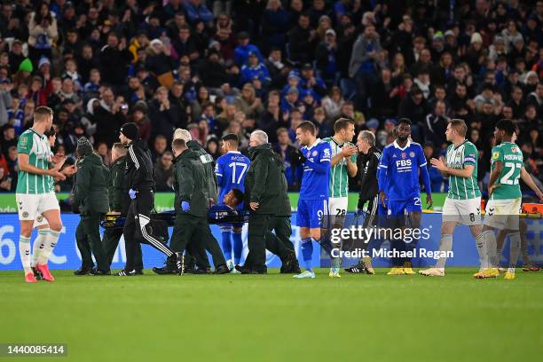 James Justin of Leicester City is stretchered off after an injury during the Carabao Cup Third Round match between Leicester City and Newport County...