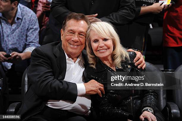 Donald Sterling, owner of the Los Angeles Clippers, left and his wife Shelly pose for a photograph before his team played the Memphis Grizzlies in...