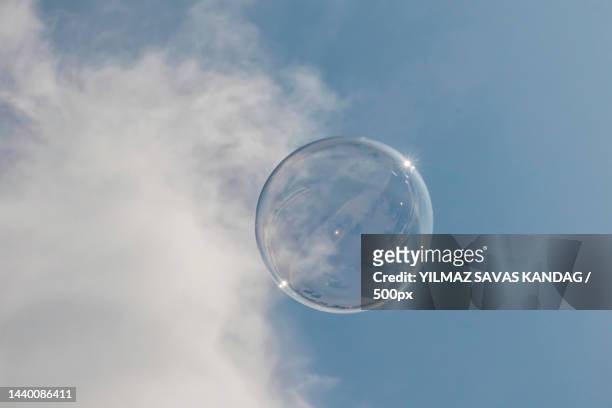 low angle view of bubble against sky - soap bildbanksfoton och bilder
