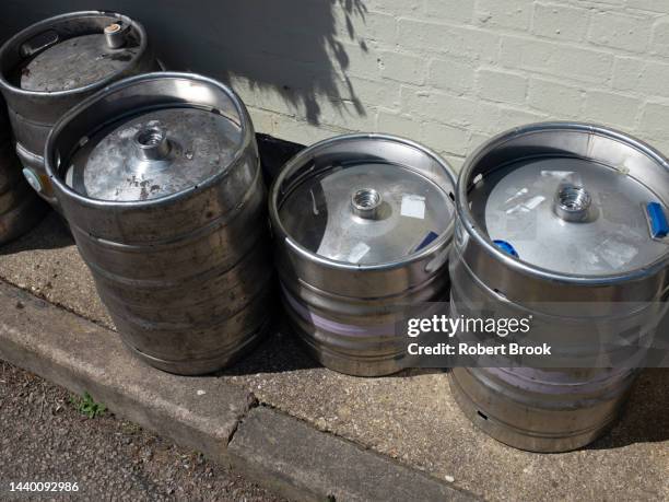 beer casks and kegs outside english public house - brewer street stock pictures, royalty-free photos & images