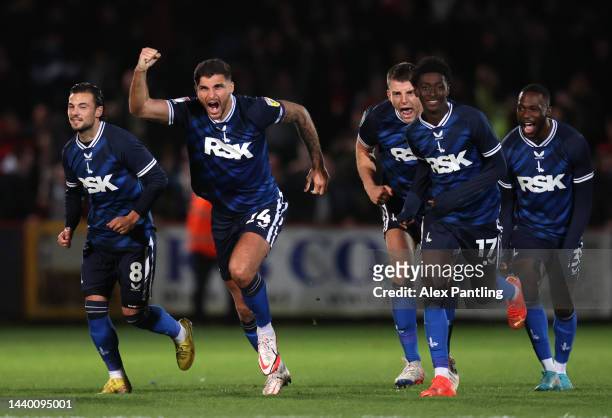 Ryan Inniss of Charlton Athletic and team mates celebrate after their win in the penalty shoot-out during the Carabao Cup Third Round match between...
