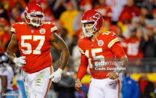 Patrick Mahomes of the Kansas City Chiefs and Orlando Brown Jr. #57 of the Kansas City Chiefs run off the field after a two-point conversion play in...