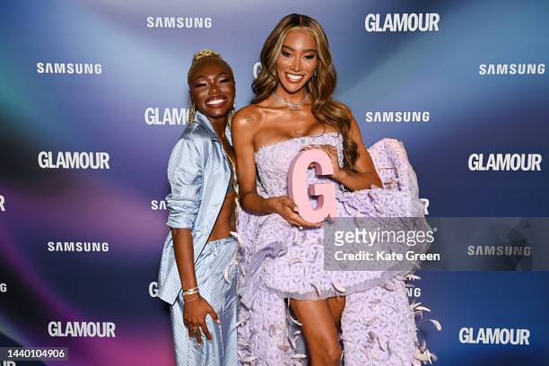 Sharon Chuter and Munroe Bergdorf pose with the Beauty game changer award in the winners room at the Glamour Women of the Year Awards 2022 at...