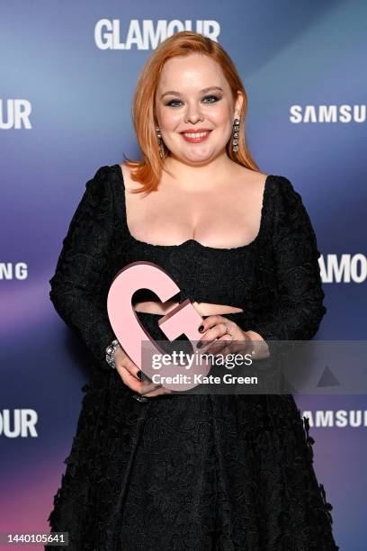 Nicola Coughlan poses with the Best TV Actor award in the winners room at the Glamour Women of the Year Awards 2022 at Outernet London on November...