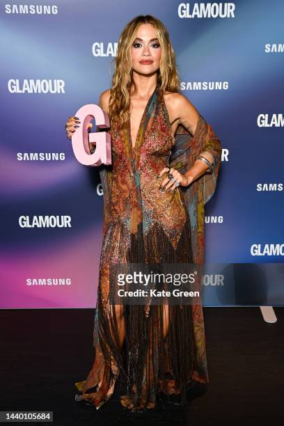 Rita Ora poses with the Entertainer of the year award in the winners room at the Glamour Women of the Year Awards 2022 at Outernet London on November...
