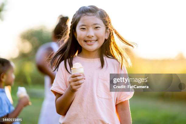 kids eating ice cream - mr whippy ice cream stock pictures, royalty-free photos & images