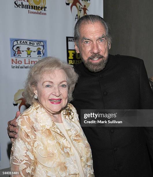 Actress Betty White and Paul Mitchell CEO John Paul DeJoria attends Paul Mitchell's 9th Annual Fundraiser at The Beverly Hilton Hotel on May 7, 2012...