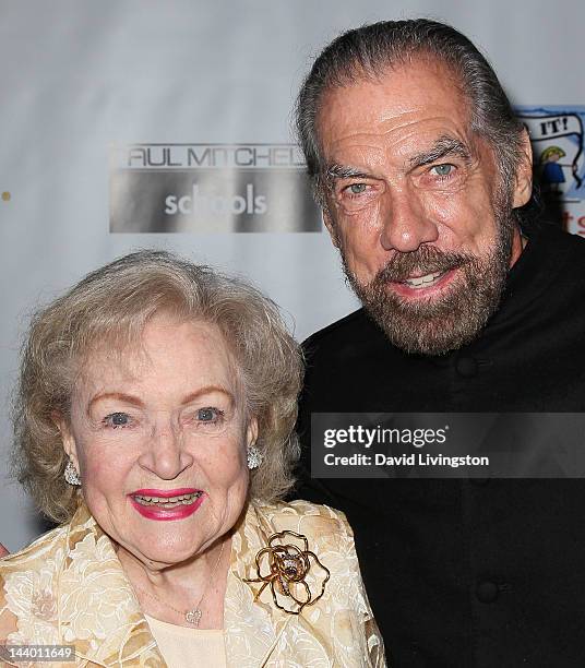 Actress Betty White and Paul Mitchell CEO John Paul DeJoria attend Paul Mitchell's 9th Annual Fundraiser at the Beverly Hilton on May 7, 2012 in...