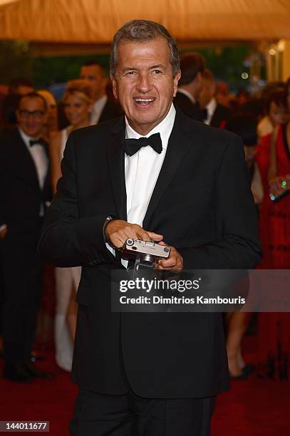 Mario Testino attends the "Schiaparelli And Prada: Impossible Conversations" Costume Institute Gala at the Metropolitan Museum of Art on May 7, 2012...