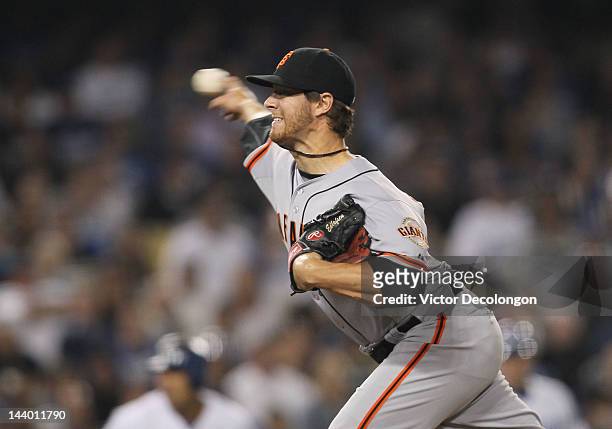 Pitcher Steve Edlefsen of the San Francisco Giants pitches in the seventh inning against the Los Angeles Dodgers during the MLB game at Dodger...