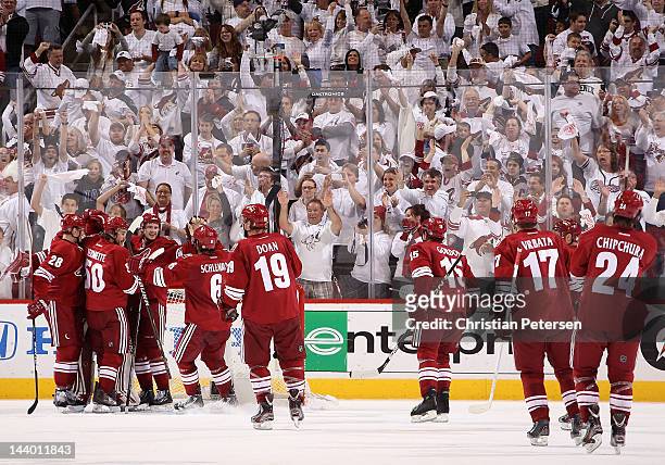 Oliver Ekman-Larsson of the Phoenix Coyotes celebrates with teammates after defeating the Nashville Predators in Game Five of the Western Conference...