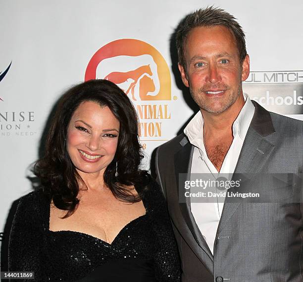 Actress Fran Drescher and writer Peter Marc Jacobson attend Paul Mitchell's 9th Annual Fundraiser at the Beverly Hilton on May 7, 2012 in Beverly...