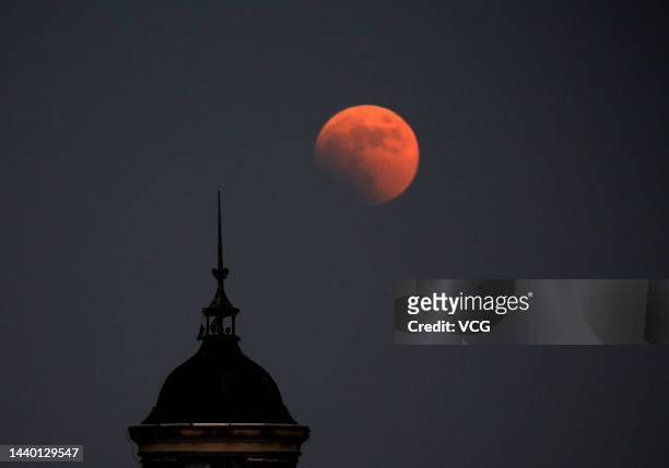 The moon is seen during a total lunar eclipse on November 8, 2022 in Nantong, Jiangsu Province of China.