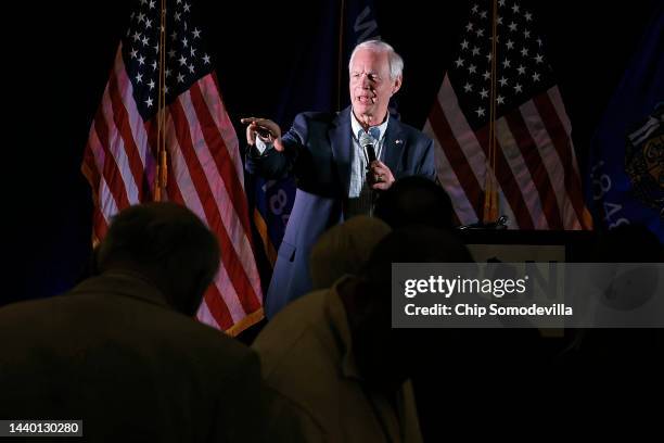 Sen. Ron Johnson talks to supporter during an Election Night party at the Best Western Premier Bridgewood Resort on November 08, 2022 in Neenah,...