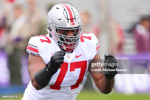 Paris Johnson Jr. #77 of the Ohio State Buckeyes in action against the Northwestern Wildcats during the first half at Ryan Field on November 05, 2022...