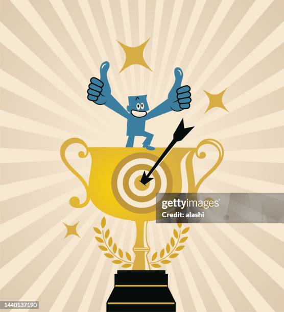 a champion with a big gold trophy shows a dartboard and arrow and gives a thumbs-up, the concept of thinking like a champion or acting like a champion - sports champion 幅插畫檔、美工圖案、卡通及圖標