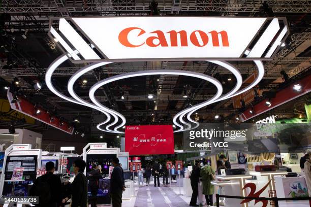 People visit the Canon booth during the 5th China International Import Expo at the National Exhibition and Convention Center on November 8, 2022 in...