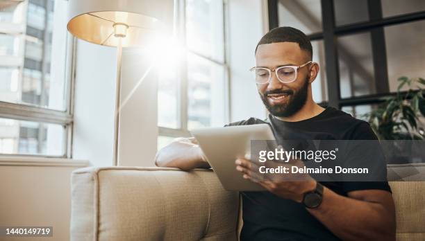 businessman, tablet and strategy planning in creative company, digital marketing office and advertising startup. smile, happy and technology for working designer in fintech goals management for brand - happy ipad beautiful stockfoto's en -beelden