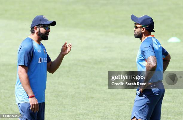 Rohit Sharma of India talks to Suryakumar Yadav during a India T20 World Cup squad training session at Adelaide Oval on November 09, 2022 in...