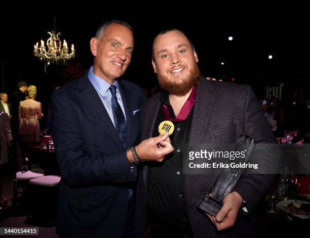 President and CEO Mike O'Neill and Luke Combs attend the 2022 BMI Country Awards at BMI on November 08, 2022 in Nashville, Tennessee.