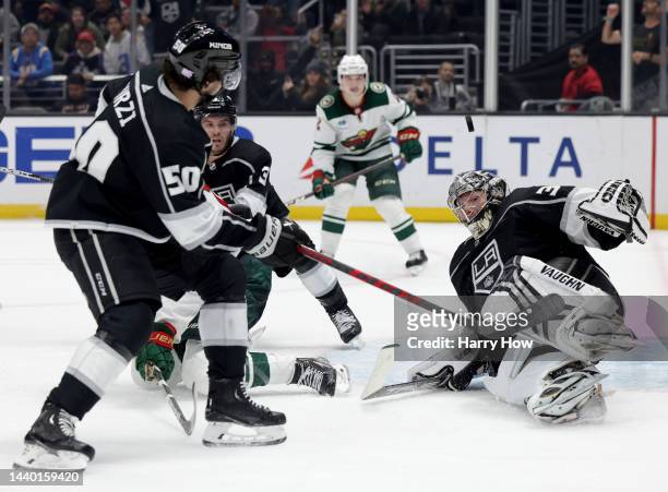 Jonathan Quick of the Los Angeles Kings makes a last second save during the third period in a 1-0 Kings win over the Minnesota Wild at Crypto.com...