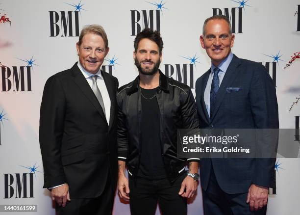 Of Creative in Nashville of BMI, Clay Bradley, Matt Thomas of Parmalee and President and CEO of BMI, Mike O'Neill attend the 2022 BMI Country Awards...