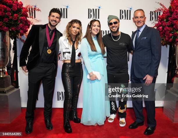 Ben Johnson, KK Johnson and Jenna Johnson of Track45, Shy Carter and BMI President and CEO Mike O'Neill attend the 2022 BMI Country Awards at BMI on...