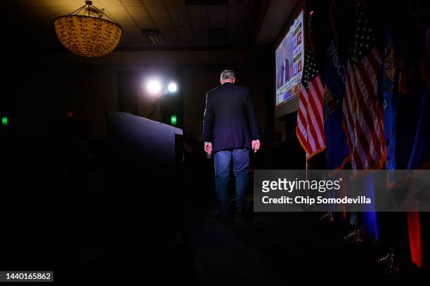 Sen. Ron Johnson walks off the stage after speaking to his supporters during an election night party at the Best Western Premier Bridgewood Resort on...